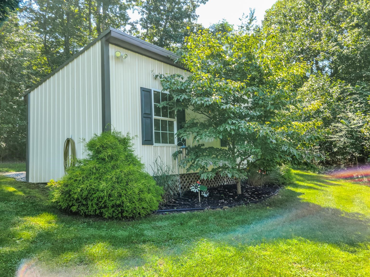 6089 Faughts Road Mount Crawford, VA 22841 - Photo 65 of 68 a view of a house with a backyard and swimming pool