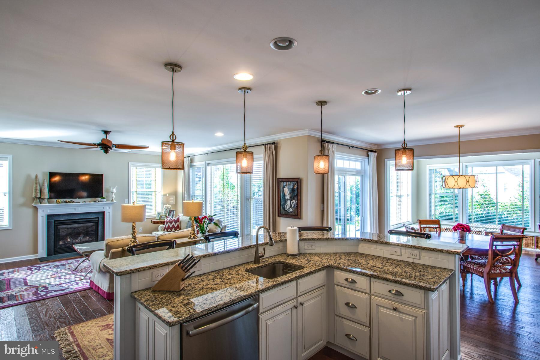16611 Shoal Road Lewes, DE 19958 - Photo 12 of 60 Kitchen open to great room, dining area, & sunroom