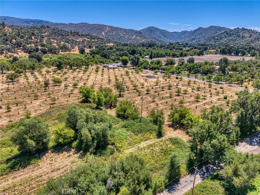 1286 Pitney Lane Upper Lake, CA 95485 - Photo 15 of 31 a view of a lake with mountains in the background