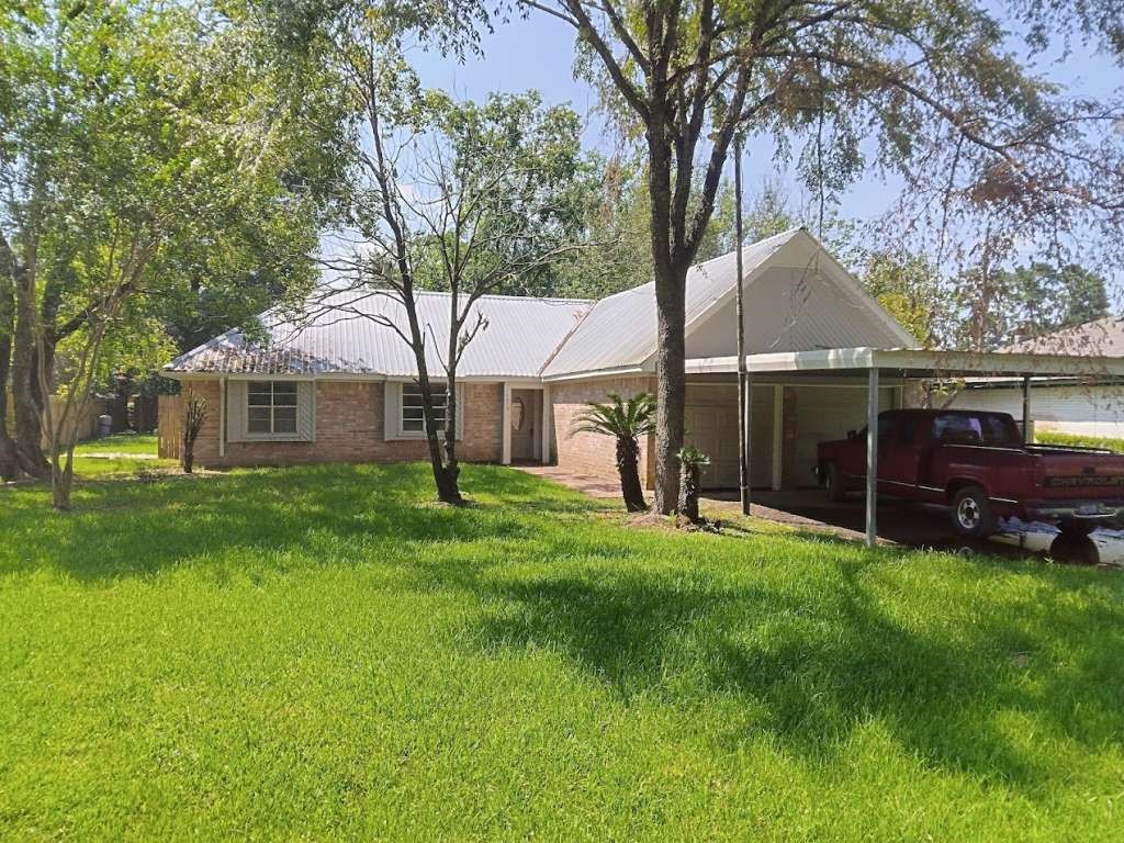 5410 Dibello Forest Lane Spring, TX 77373 - Photo 2 of 11 a view of house with backyard