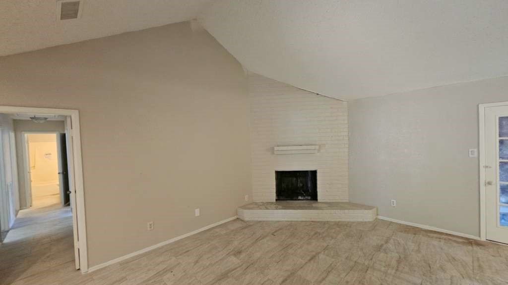 5410 Dibello Forest Lane Spring, TX 77373 - Photo 6 of 11 an empty room with fireplace