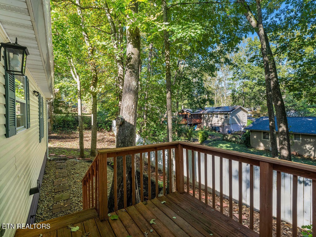 170 Cedar Circle Powell, TN 37849 - Photo 19 of 27 a view of a wooden balcony and trees