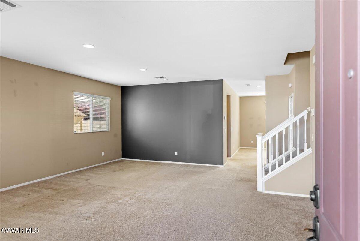 1450 Green Street Tehachapi, CA 93561 - Photo 4 of 27 a view of an empty room with a window