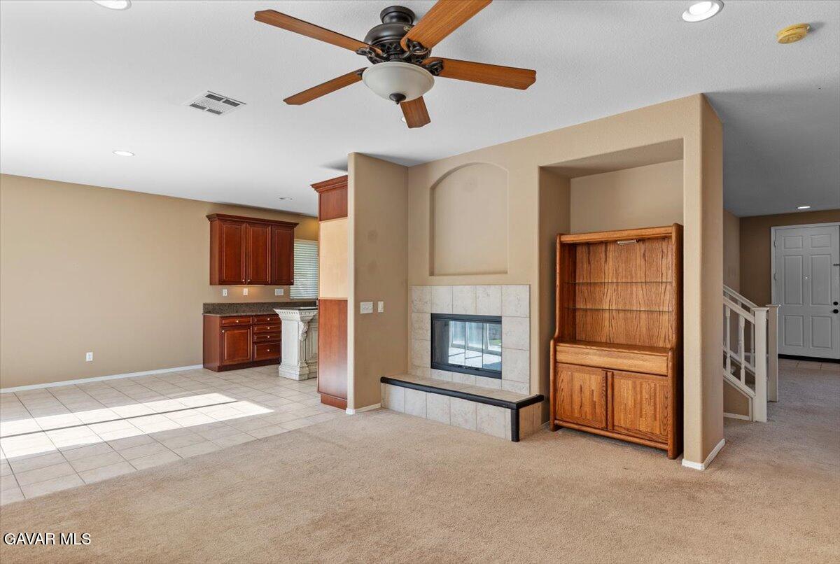 1450 Green Street Tehachapi, CA 93561 - Photo 7 of 27 a living room with furniture and a fireplace