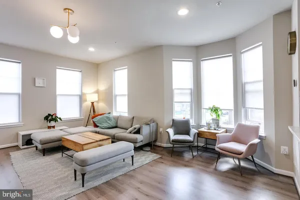 a living room with furniture or couch and a window