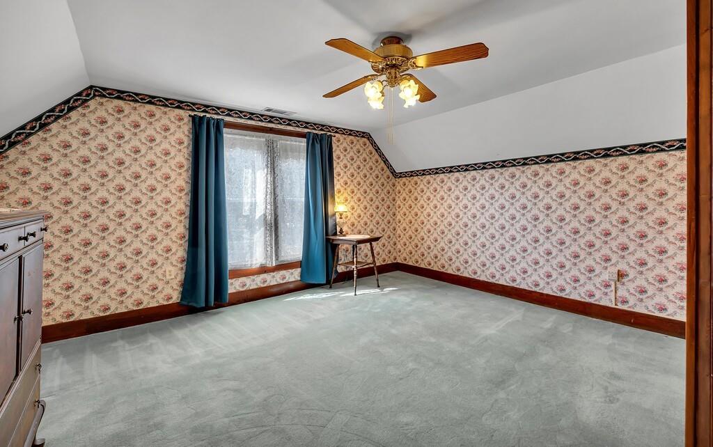 515 Hackberry Street Clifton, TX 76634 - Photo 27 of 40 an empty room with windows