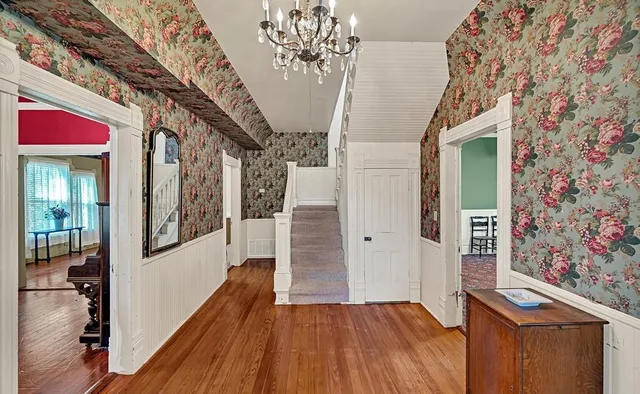 a view of entryway with wooden floor