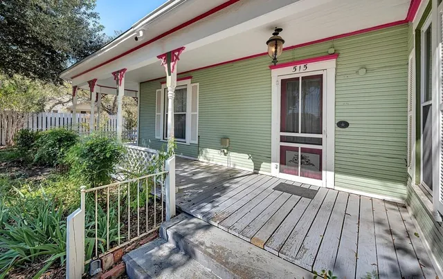 a view of deck with patio and yard