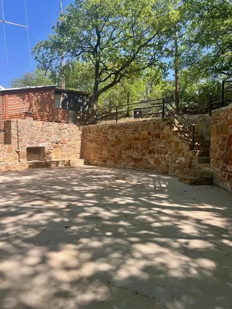 a view of a yard with an outdoor space