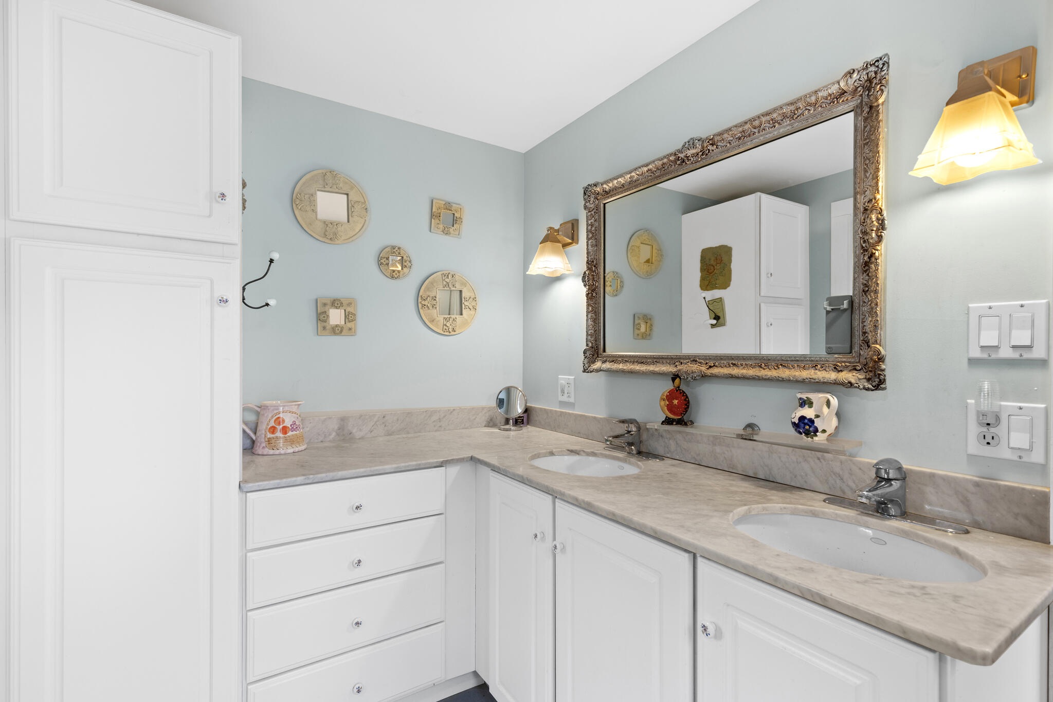 311 South Sunken Meadow Road Eastham, MA 02642 - Photo 44 of 57 a bathroom with a granite countertop sink and a mirror