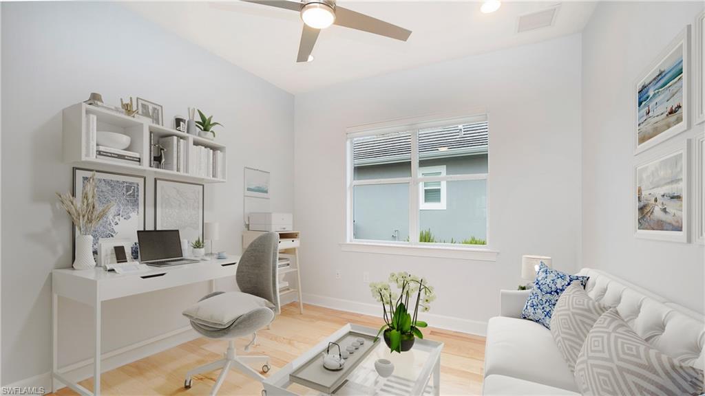 5060 Martinique Drive Naples, FL 34113 - Photo 19 of 38 a living room with furniture and a table
