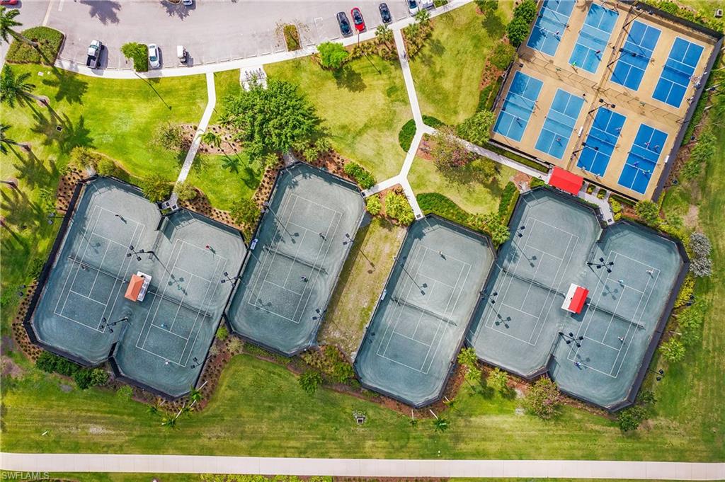 5060 Martinique Drive Naples, FL 34113 - Photo 33 of 38 an aerial view of residential house with outdoor space and parking