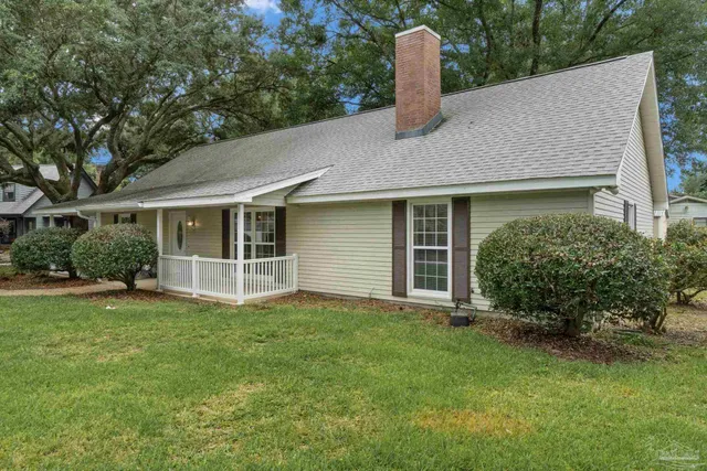 a house view with a garden space