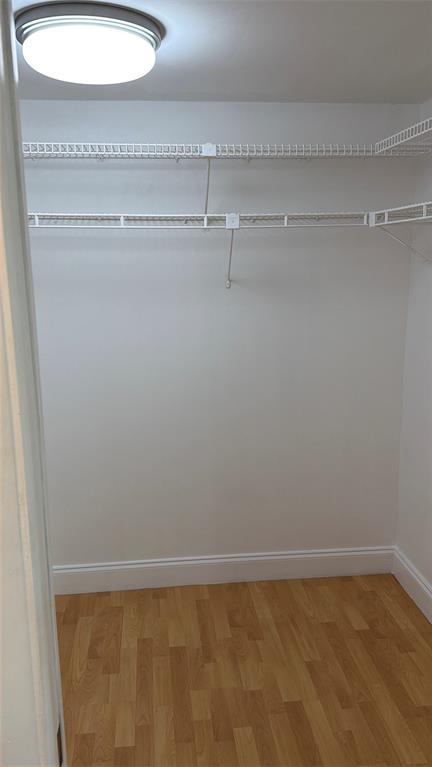 10777 West Sample Road, Unit 1104 Coral Springs, FL 33065 - Photo 20 of 25 a view of a room with racks on the wall