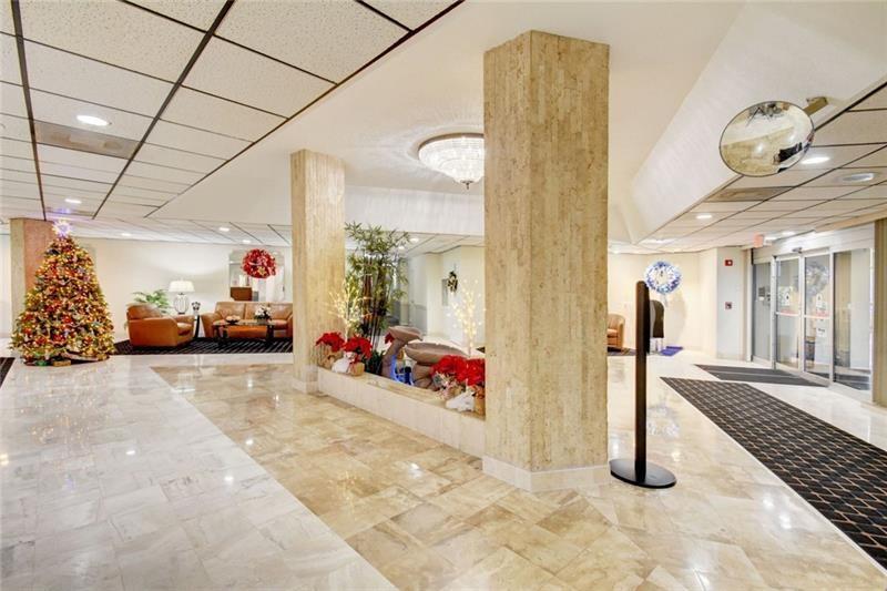 10777 West Sample Road, Unit 1104 Coral Springs, FL 33065 - Photo 8 of 25 a view of a entryway door