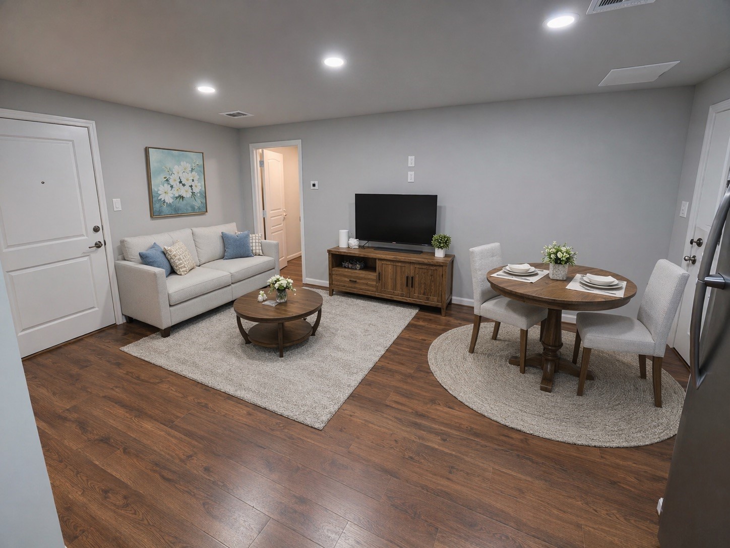 19103 Whitewood Drive Spring, TX 77373 - Photo 24 of 30 a living room with furniture a flat screen tv and a large window