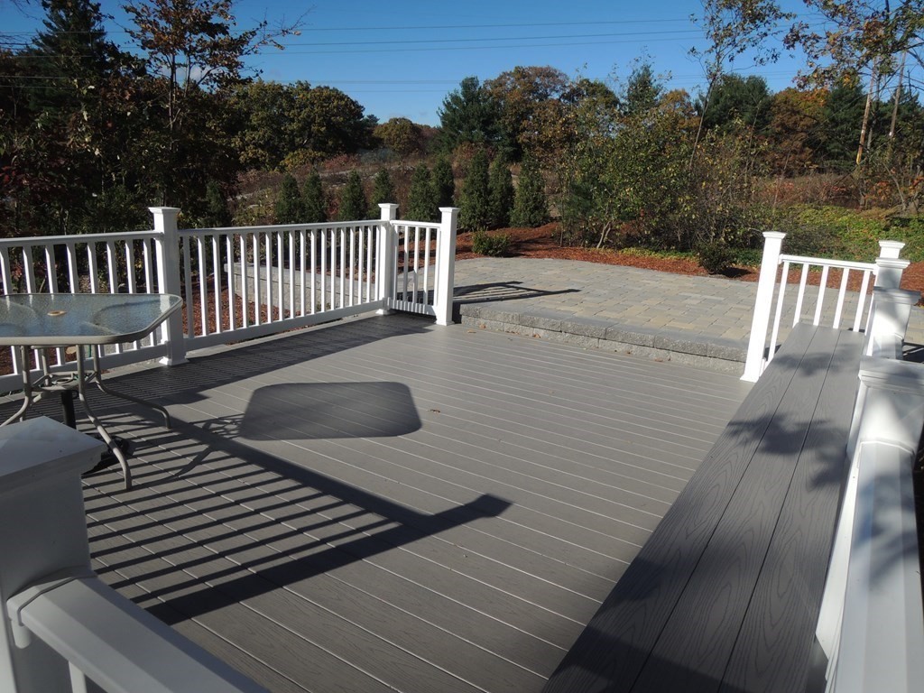 39 Locust Street Burlington, MA 01803 - Photo 26 of 27 a view of deck with wooden floor and outdoor seating