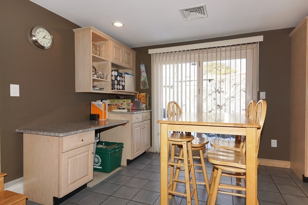 39 Locust Street Burlington, MA 01803 - Photo 5 of 27 a view of cabinets with window