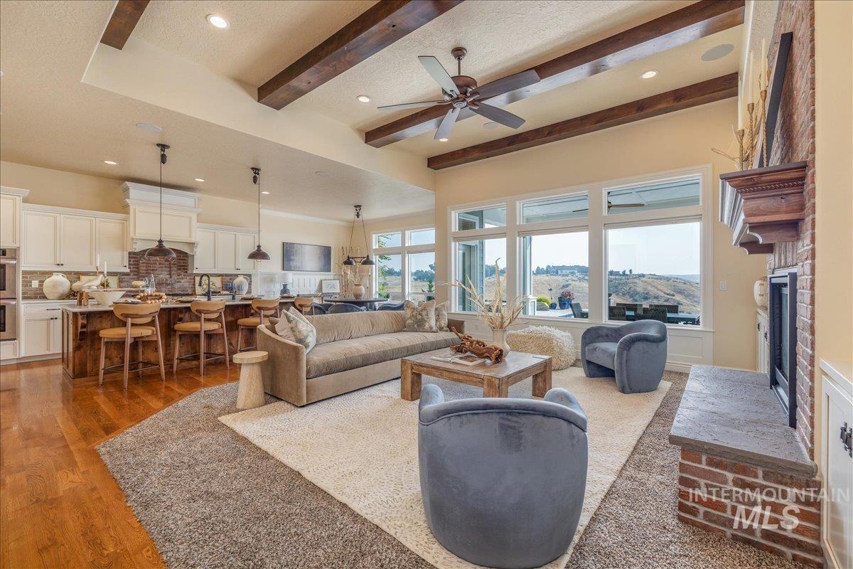 5744 North Star Ridge Way Star, ID 83669 - Photo 40 of 50 Infinity-edge pool with a surrounding stone patio