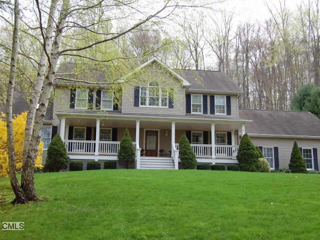 11 Signal Hill Road Brookfield, CT 06804 - Photo 1 of 1 a front view of a house with a yard and trees