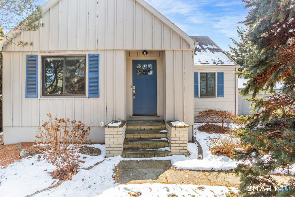 245 Reid Street Fairfield, CT 06824 - Photo 2 of 33 a front view of a house
