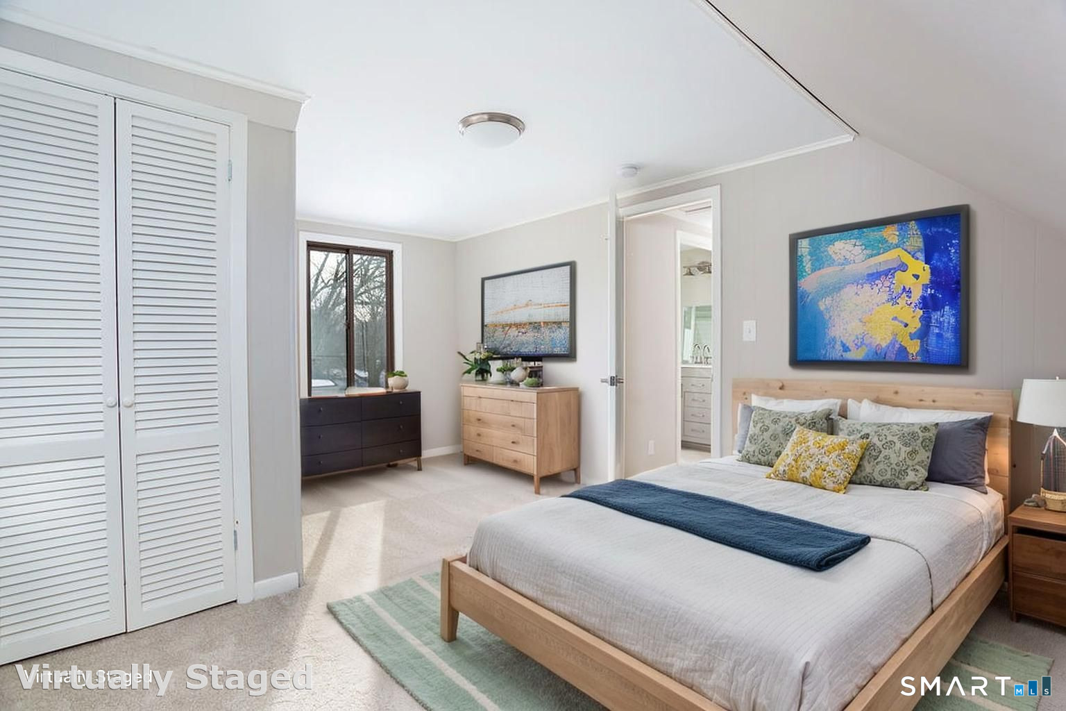 245 Reid Street Fairfield, CT 06824 - Photo 24 of 33 a bedroom with a bed and a view of bathroom