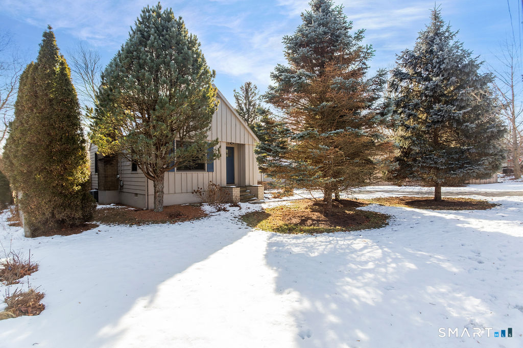 245 Reid Street Fairfield, CT 06824 - Photo 30 of 33 a view of a house with entertaining space
