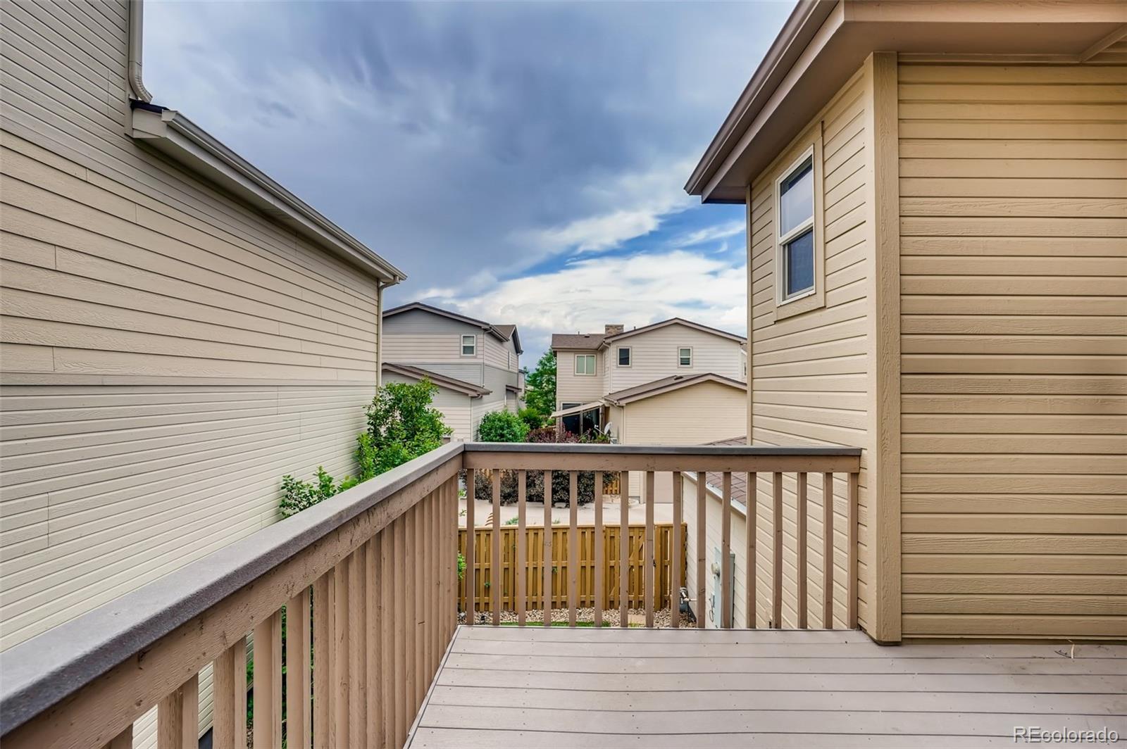 9817 Dunning Circle Highlands Ranch, CO 80126 - Photo 27 of 28 a view of a house with a deck