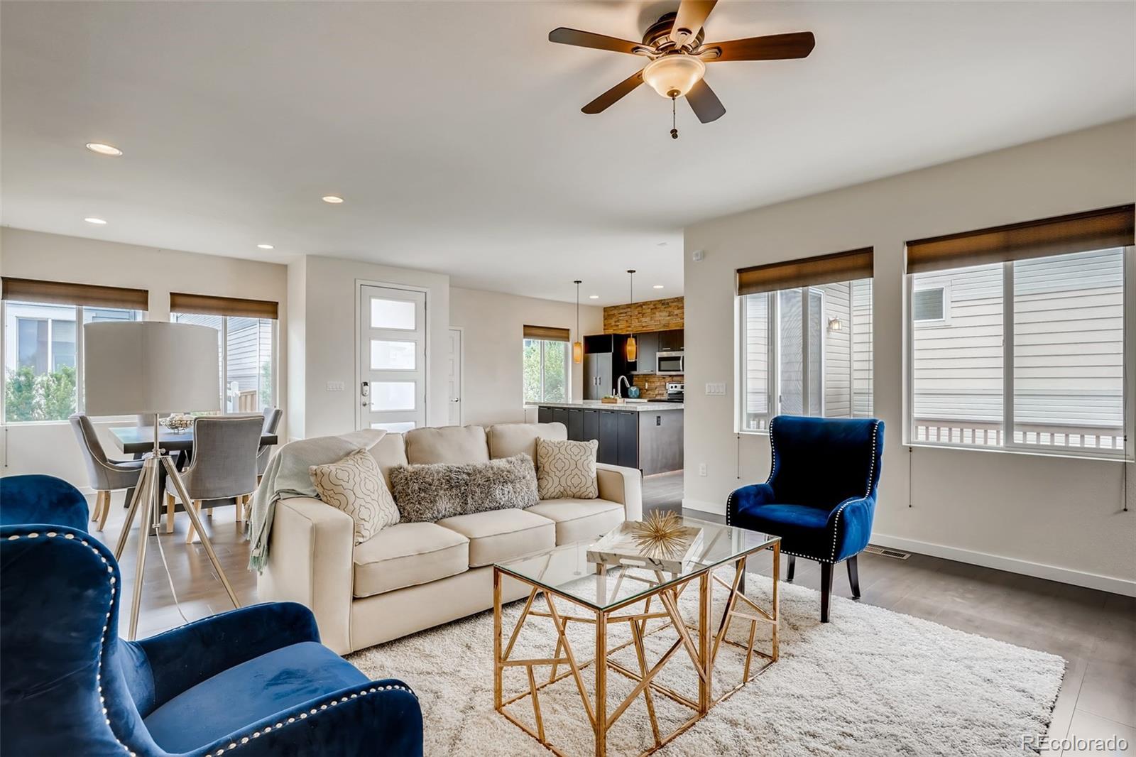 9817 Dunning Circle Highlands Ranch, CO 80126 - Photo 4 of 28 a living room with furniture and a window