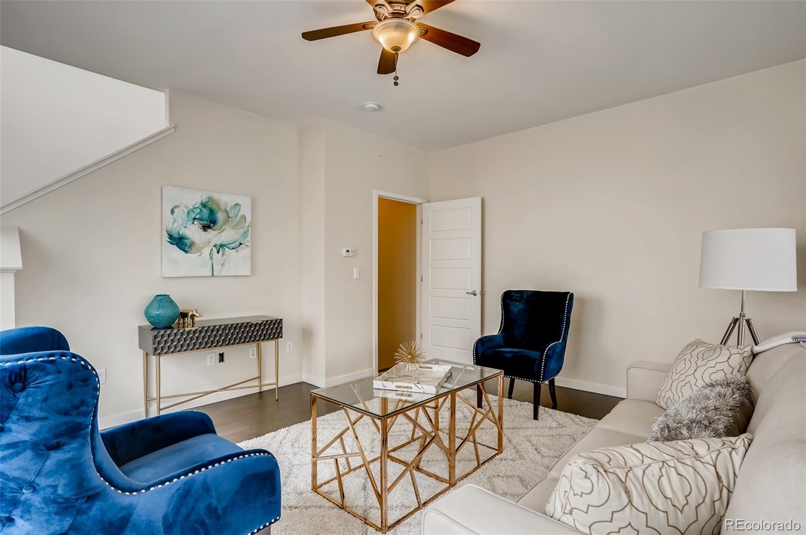 9817 Dunning Circle Highlands Ranch, CO 80126 - Photo 5 of 28 a living room with furniture