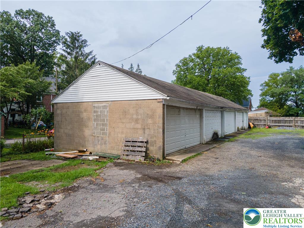 228 North 14th Street Easton, PA 18042 - Photo 11 of 12 a front view of a house with a yard