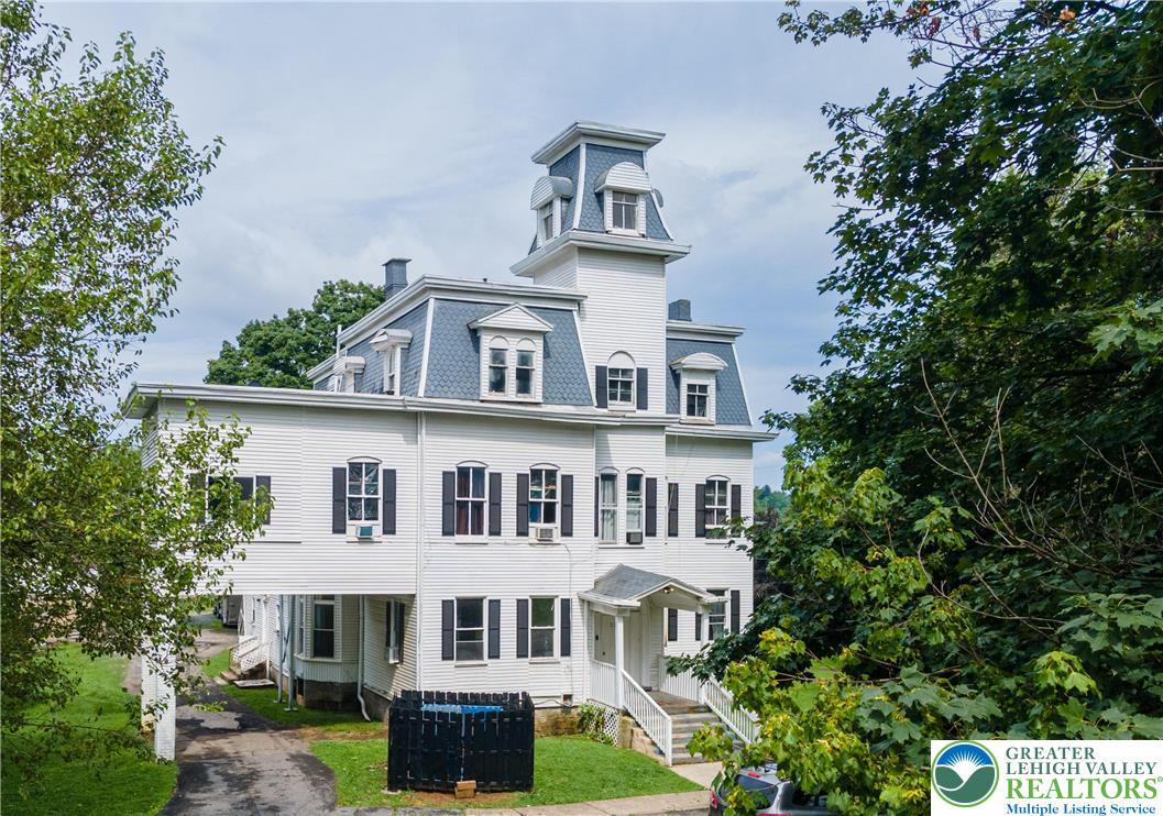 228 North 14th Street Easton, PA 18042 - Photo 2 of 12 a front view of a house with a garden