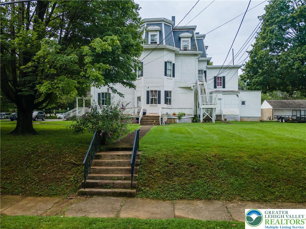 228 North 14th Street Easton, PA 18042 - Photo 8 of 12 a front view of a house with a yard