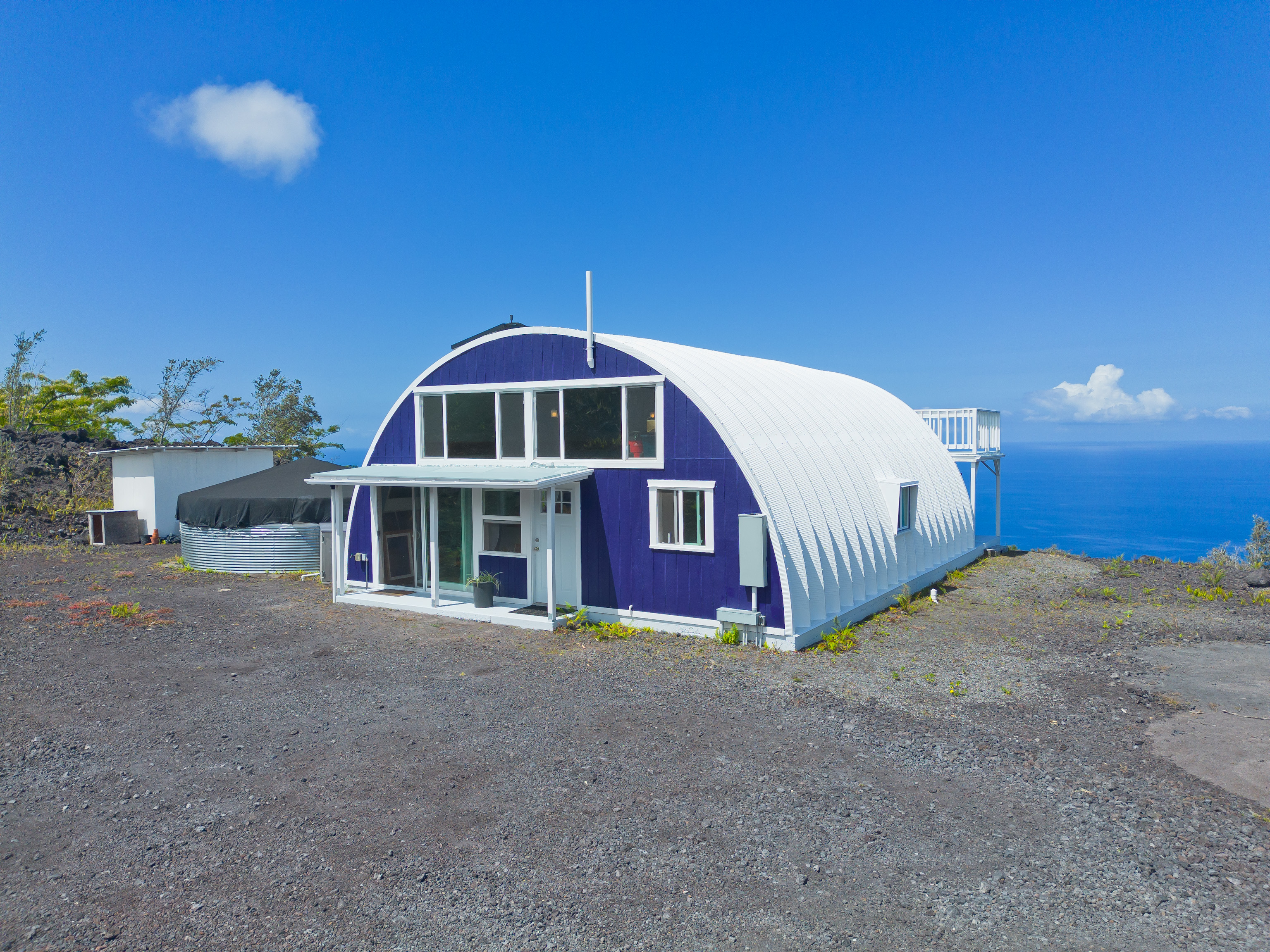 87-4521 Keahi Kai Place Captain Cook, HI 96704 - Photo 1 of 25 a front view of a house with a yard