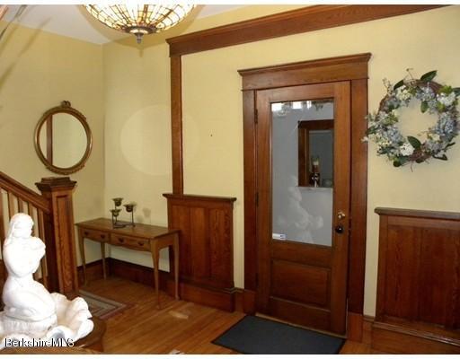 335 Federal Street Greenfield, MA 01301 - Photo 2 of 30 a view of a livingroom with furniture and a bathroom