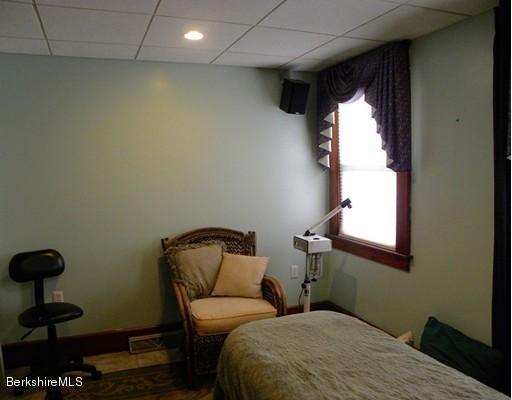 335 Federal Street Greenfield, MA 01301 - Photo 13 of 30 a bedroom with a bed and a window