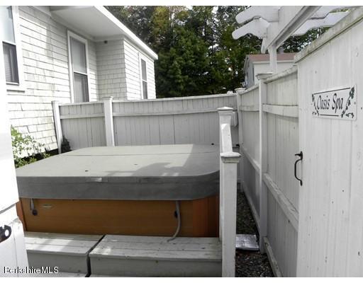 335 Federal Street Greenfield, MA 01301 - Photo 23 of 30 a view of jacuzzi and hall with wooden floor