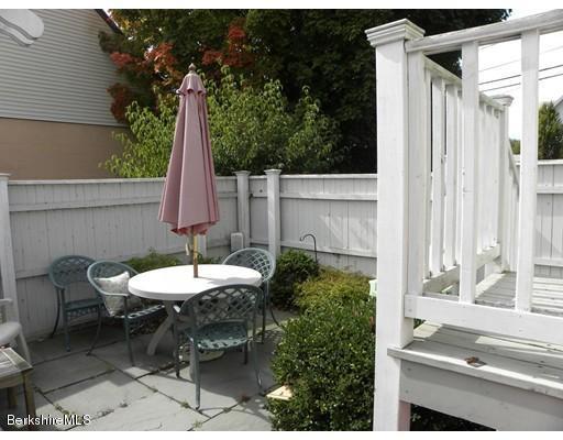 335 Federal Street Greenfield, MA 01301 - Photo 24 of 30 a view of a chair and table in the balcony