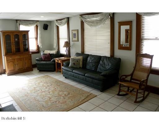 335 Federal Street Greenfield, MA 01301 - Photo 5 of 30 a living room with furniture and a window