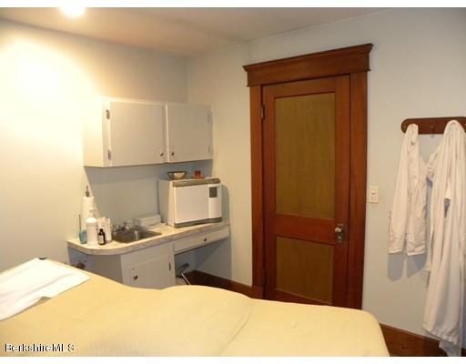 335 Federal Street Greenfield, MA 01301 - Photo 10 of 30 a bathroom with a sink toilet and shower
