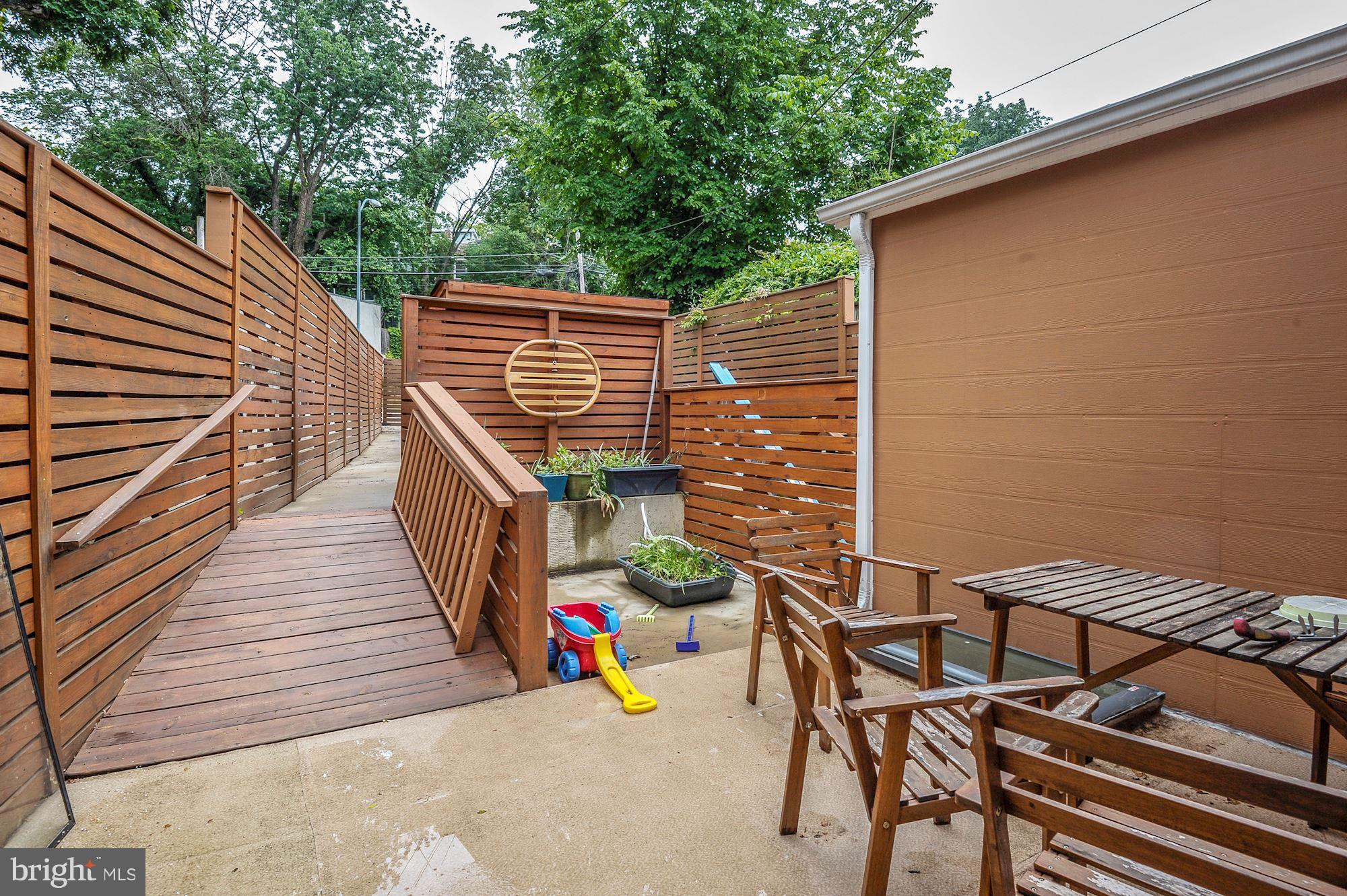 1933 Park Road Northwest Washington, DC 20010 - Photo 27 of 29 Rear deck leading to parking and storage shed