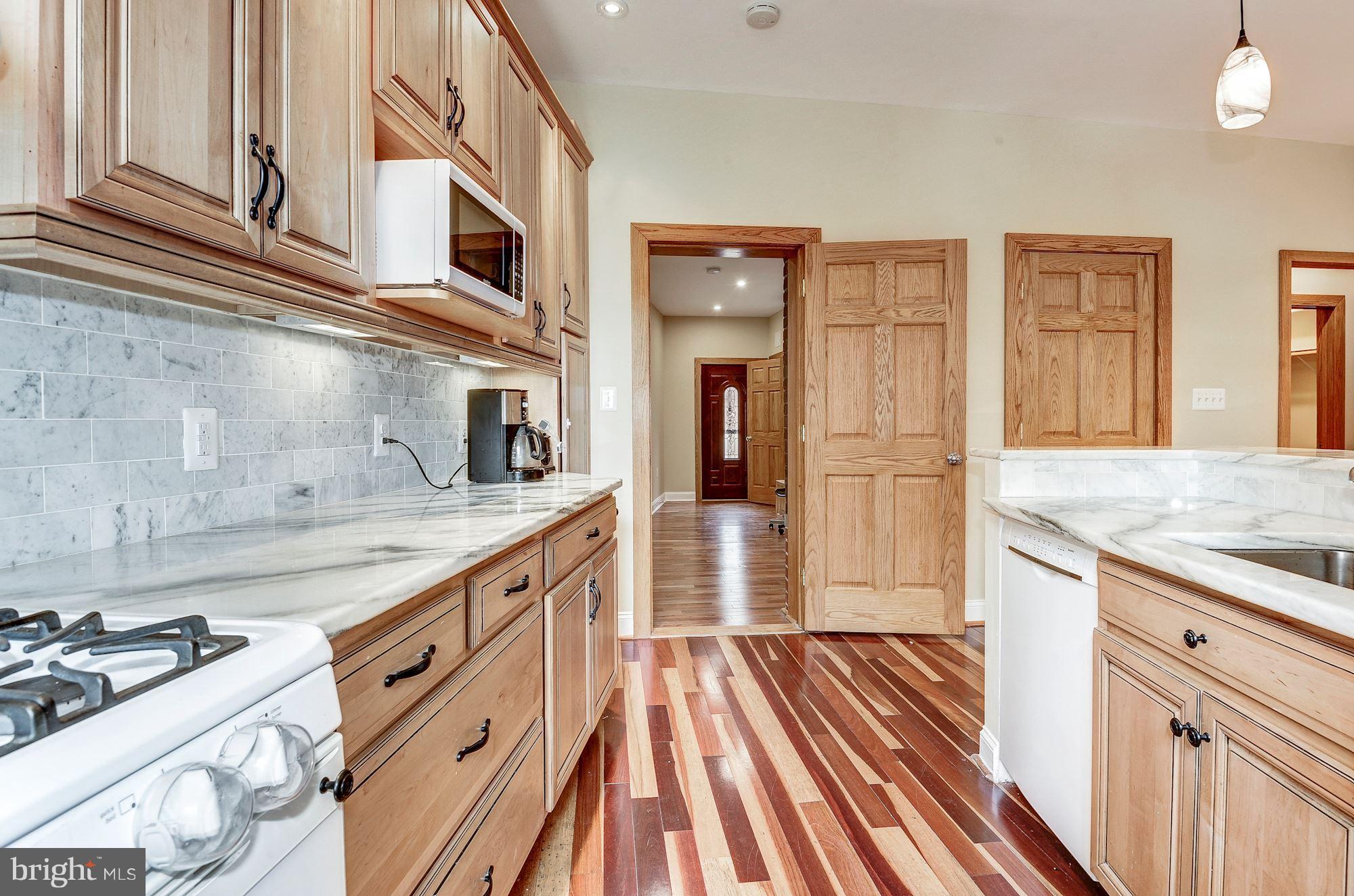 1933 Park Road Northwest Washington, DC 20010 - Photo 8 of 29 Kitchen toward den and back door