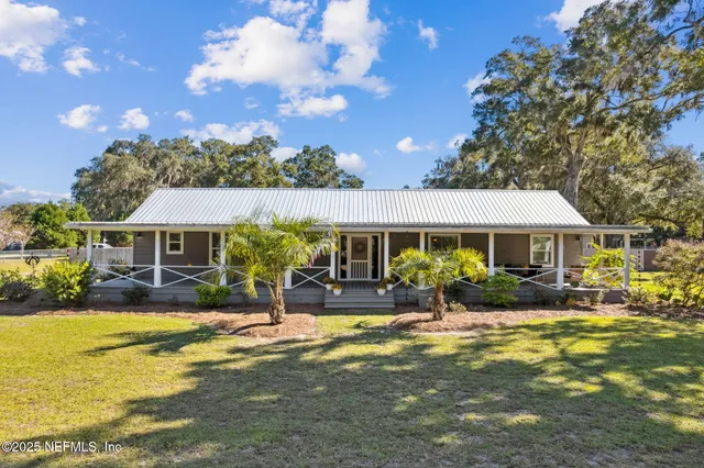 a front view of a house with yard porch and patio