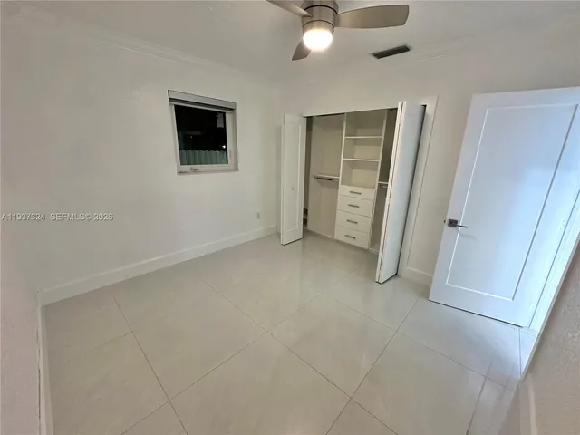 an empty room with closet