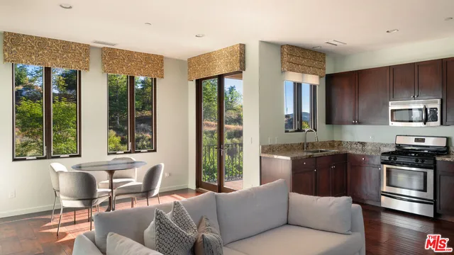 a bedroom with a bed and a fireplace