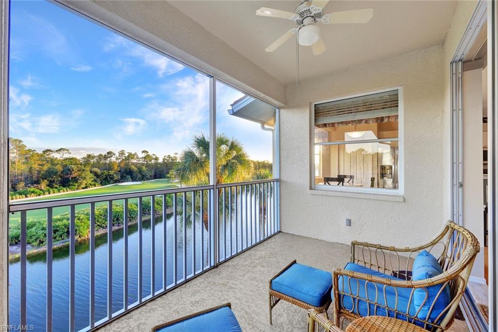 8680 Cedar Hammock Circle, Unit 142 Naples, FL 34112 - Photo 3 of 27 a view of a balcony with furniture and a ceiling fan