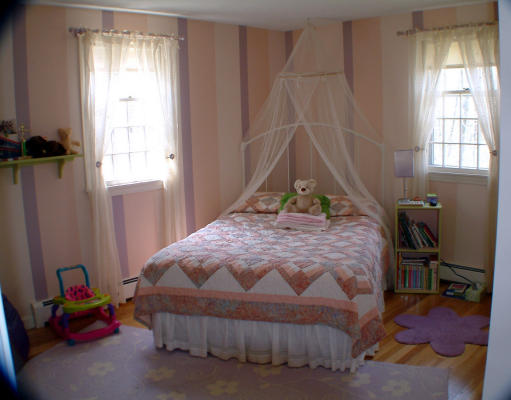 135 Raleigh Tavern Lane North Andover, MA 01845 - Photo 18 of 21 a bedroom with a bed and a window