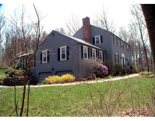 135 Raleigh Tavern Lane North Andover, MA 01845 - Photo 2 of 21 a view of a house with a yard