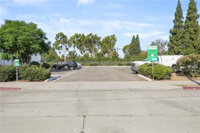 a view of road with a building in the background