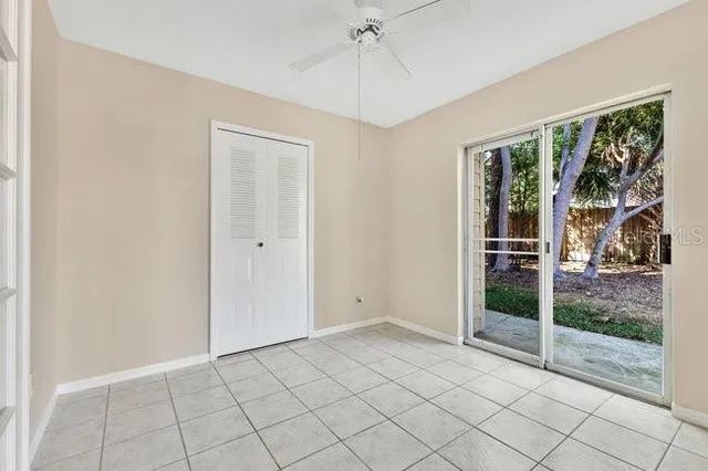 a view of a house with yard and a garden